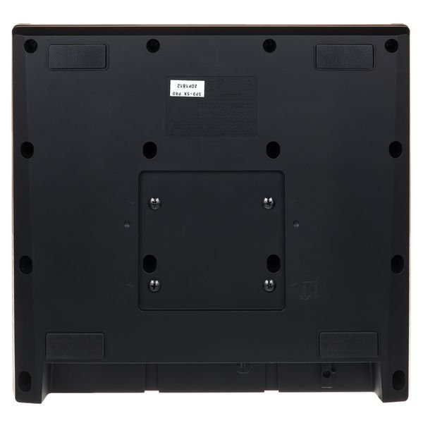 Dessous du Roland SPD-SX Pro avec la plaque de fixation à quatre vis pour support de pad