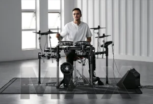 a man playing a drum set DONNER Beat Max leguidedesbatteurs.com