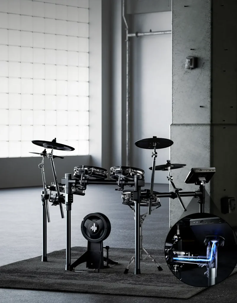 a drum set in a room
DONNER Beat Max leguidedesbatteurs.com