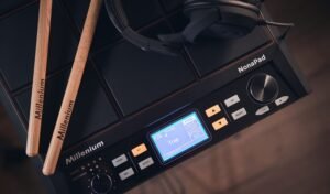 a electronic device with buttons and buttons and a drum stick millenium nonapad leguidedesbatteurs.com