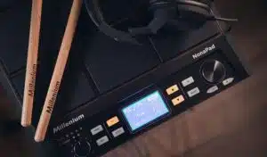 a electronic device with buttons and buttons and a drum stick millenium nonapad leguidedesbatteurs.com