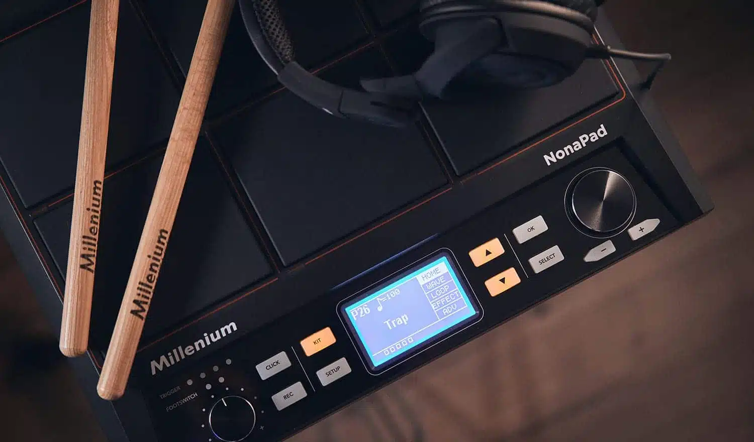 a electronic device with buttons and buttons and a drum stick millenium nonapad leguidedesbatteurs.com