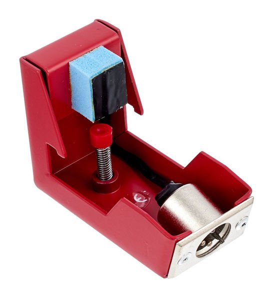Intérieur d'un trigger de tom DDrum : capteur sous mousse bleue, ressort de serrage et connecteur XLR