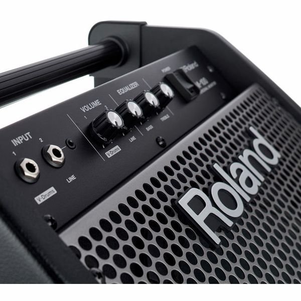 Roland PM-100 vu de dos avec sa poignée de transport