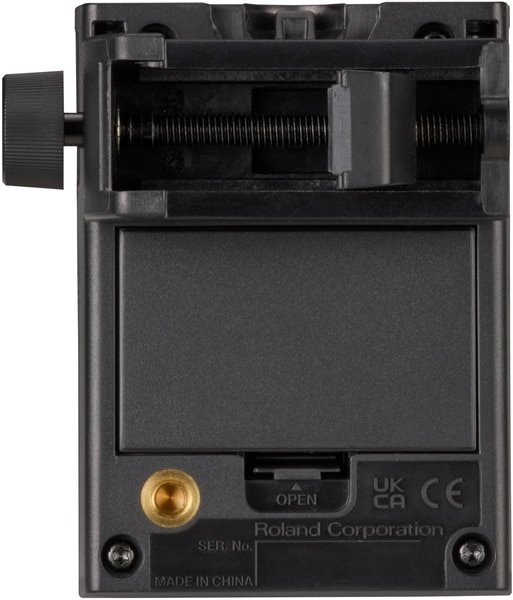 Dos du Roland WT-10 avec pince horizontale, trappe à piles et insert fileté en laiton