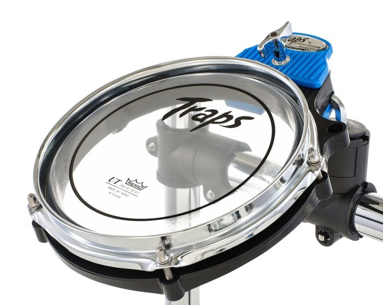 Tom plat de la Traps A300 avec peau Remo UT transparente, cercle chromé et collier bleu